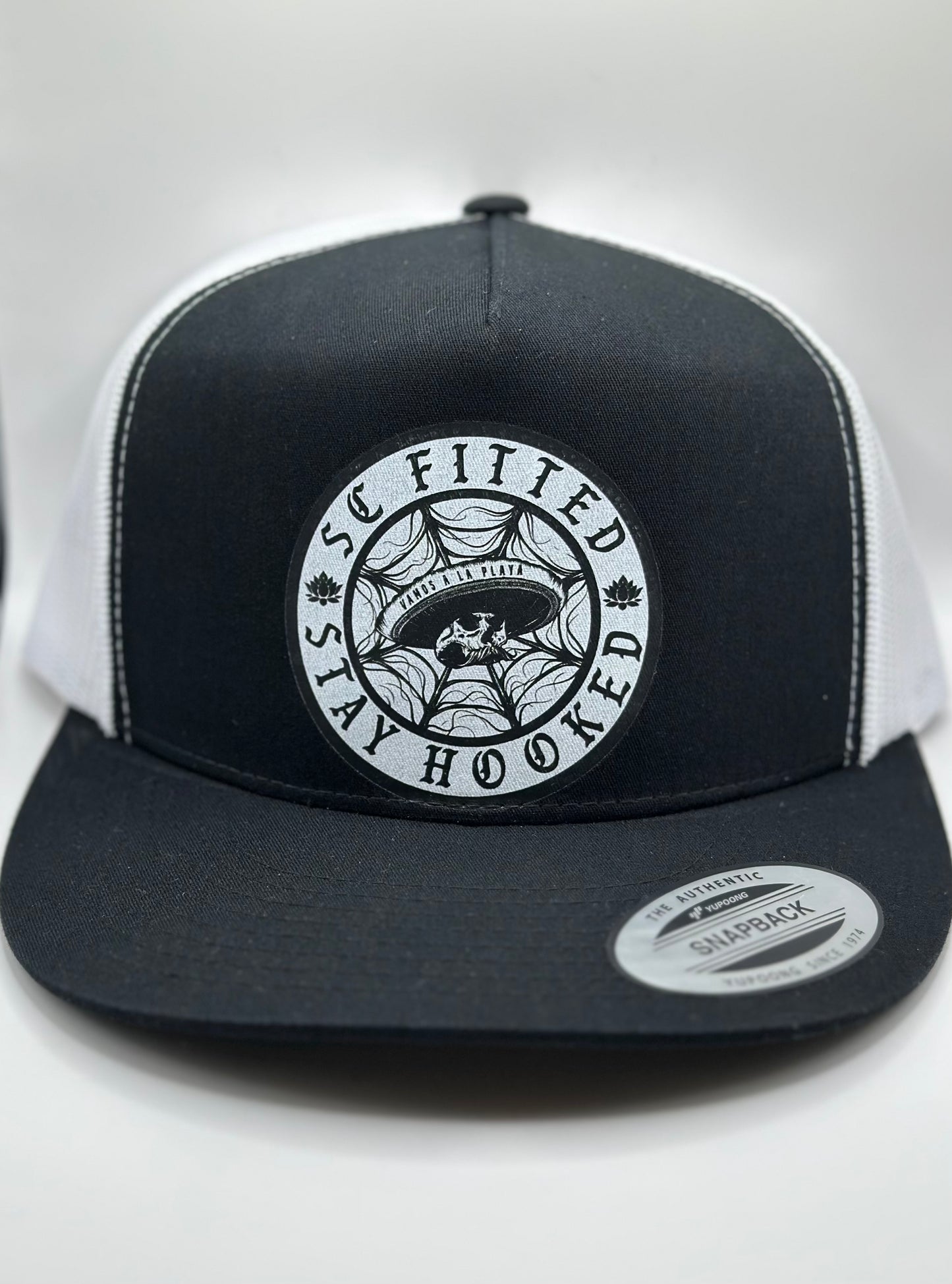 WEBBED SKULL SNAPBACK