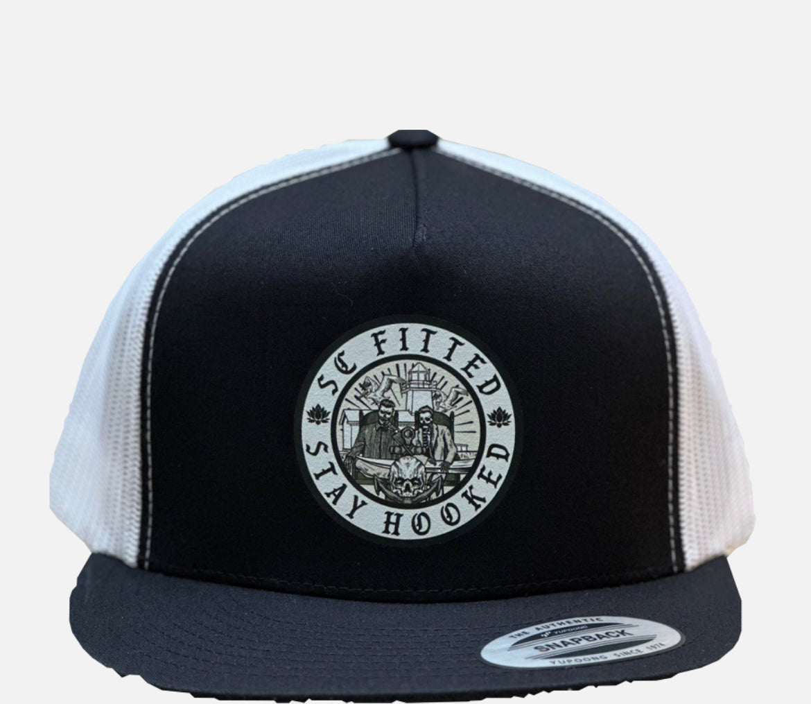 THE REGULATORS- Black/white Trucker Yupoong Classic Hat.