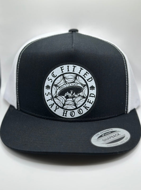 WEBBED SKULL SNAPBACK